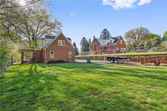 view of yard with fence