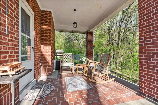 view of patio featuring a porch