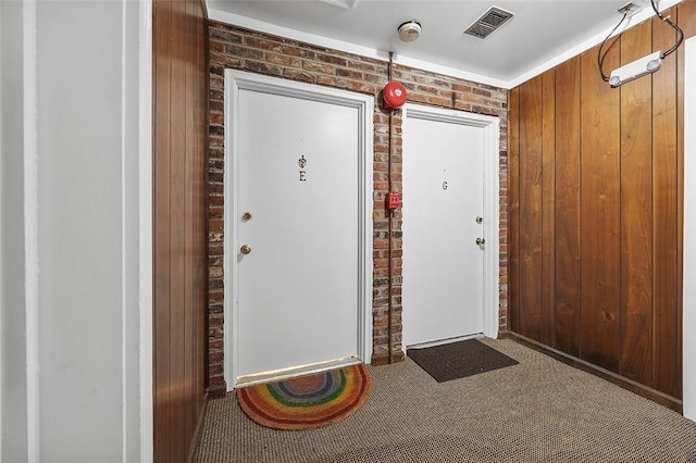 doorway to property featuring visible vents