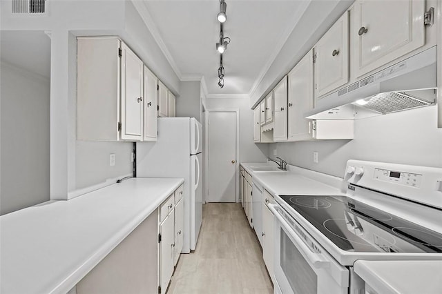 kitchen featuring visible vents, crown molding, under cabinet range hood, white appliances, and white cabinetry