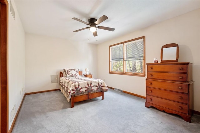bedroom with baseboards, carpet flooring, and visible vents