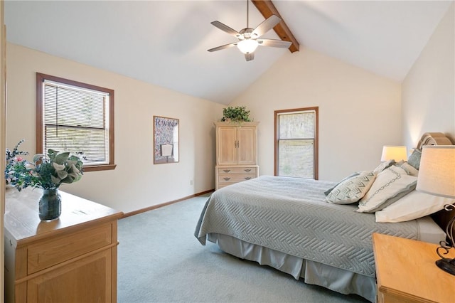 bedroom with carpet floors, baseboards, ceiling fan, and vaulted ceiling with beams