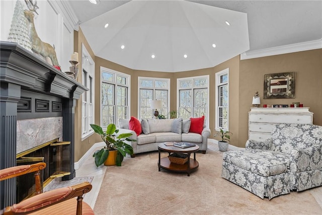 living room featuring baseboards, plenty of natural light, vaulted ceiling, and recessed lighting