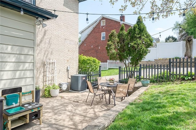 view of patio featuring fence private yard and cooling unit