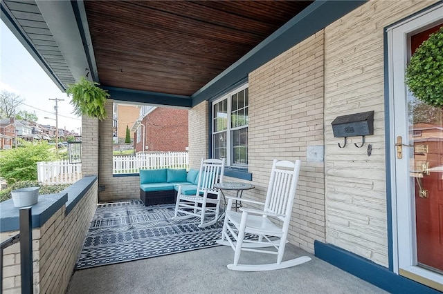 balcony featuring covered porch