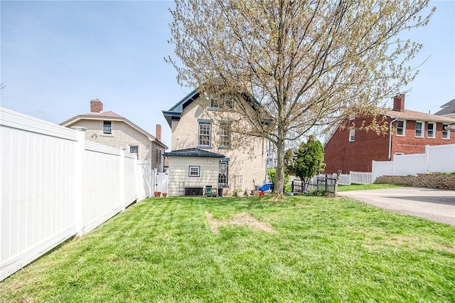 view of yard featuring fence