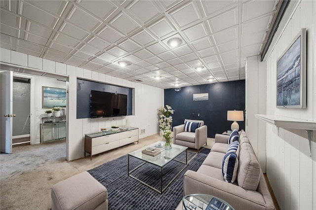 carpeted living area with visible vents