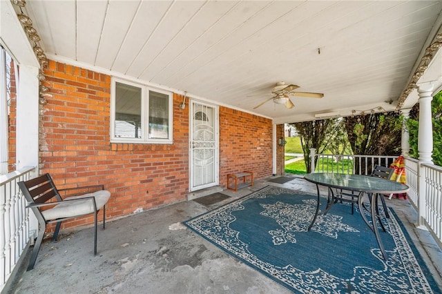 view of patio featuring ceiling fan