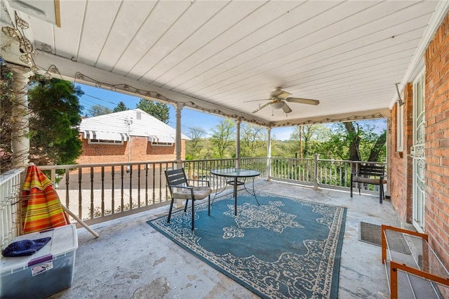 view of patio featuring a ceiling fan