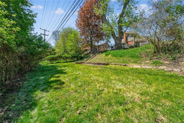 view of yard with fence