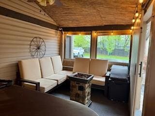 sunroom / solarium featuring a wealth of natural light