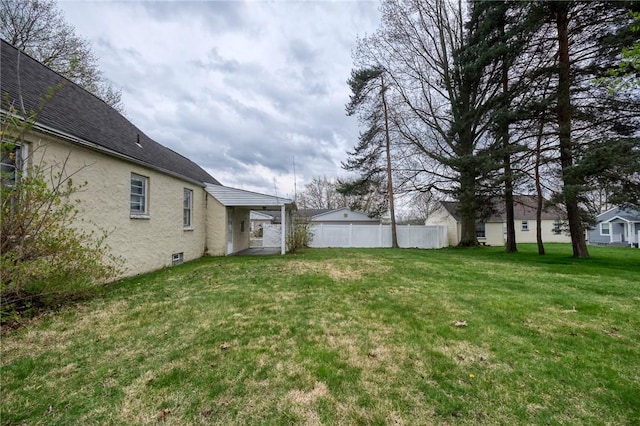 view of yard with fence