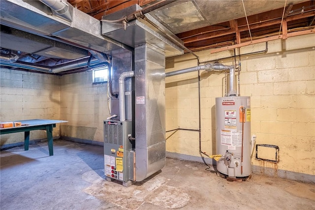 below grade area featuring heating unit and gas water heater