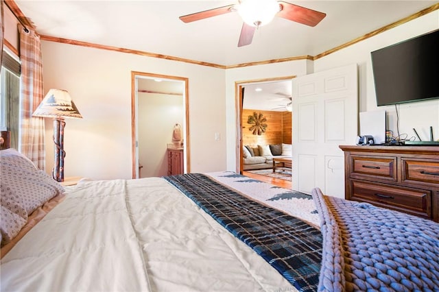 bedroom featuring crown molding and ceiling fan