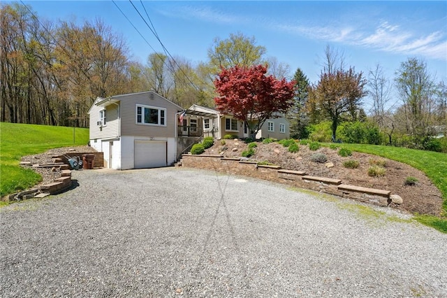 view of front of house featuring a garage and driveway