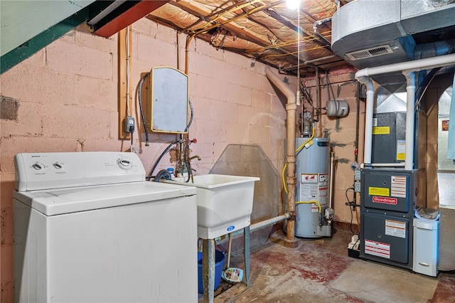 washroom with laundry area, washer / clothes dryer, visible vents, water heater, and heating unit
