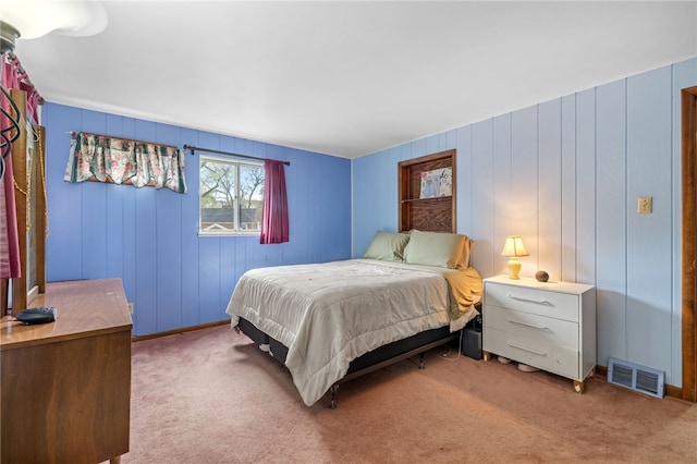 carpeted bedroom with visible vents