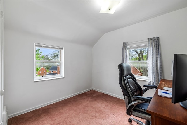 office area featuring baseboards, vaulted ceiling, and carpet