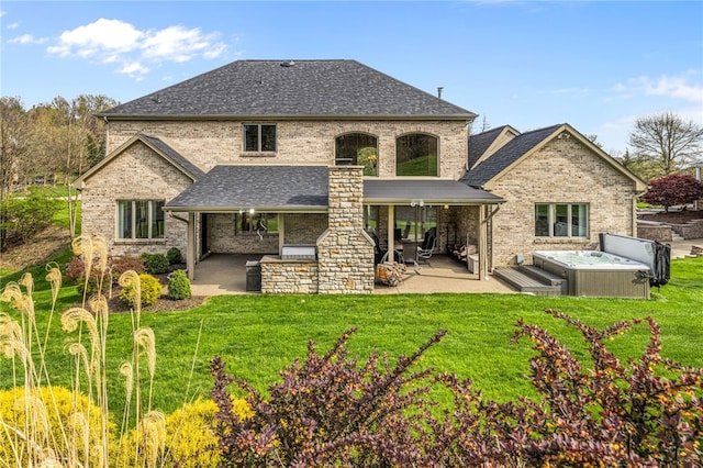 127 Bridle Trl, Peters Twp, PA 15367 - rear view of property with a patio, a hot tub, a lawn, and brick siding