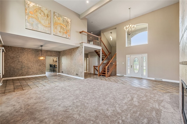 127 Bridle Trl, Peters Twp, PA 15367 - unfurnished living room featuring a chandelier, carpet, stairs, baseboards, and a towering ceiling