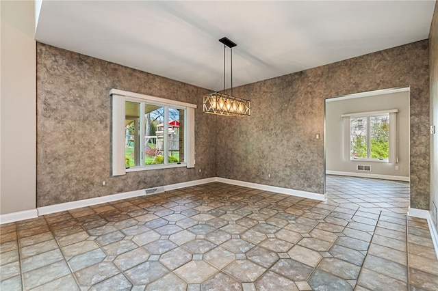 127 Bridle Trl, Peters Twp, PA 15367 - unfurnished room with an inviting chandelier, baseboards, and visible vents