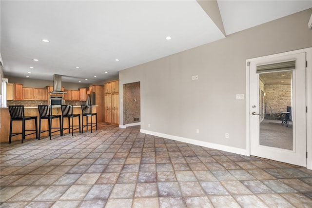 127 Bridle Trl, Peters Twp, PA 15367 - living room with baseboards, stone finish floor, and recessed lighting