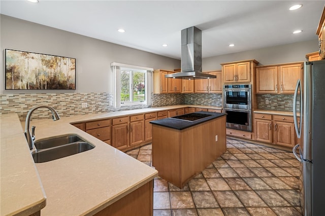 127 Bridle Trl, Peters Twp, PA 15367 - kitchen featuring decorative backsplash, island range hood, recessed lighting, a sink, and stainless steel appliances