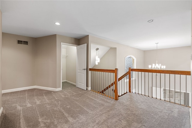 127 Bridle Trl, Peters Twp, PA 15367 - carpeted empty room featuring visible vents, recessed lighting, baseboards, and an inviting chandelier