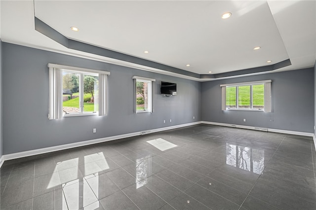 127 Bridle Trl, Peters Twp, PA 15367 - spare room featuring a raised ceiling, baseboards, and recessed lighting