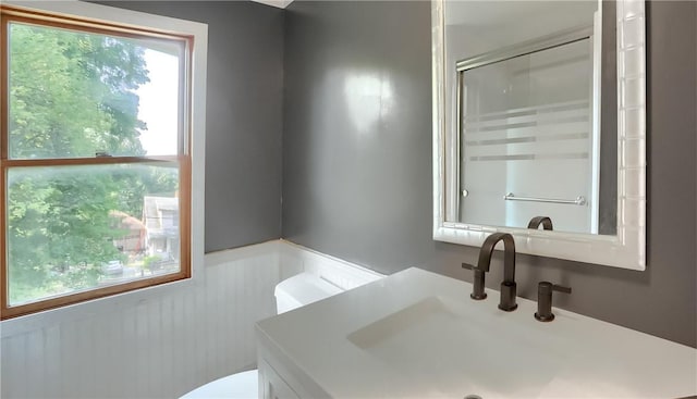 1060 Cherry Hill Rd, North Sewickley Twp, PA 16117 - bathroom with vanity, wainscoting, a shower with shower door, and toilet