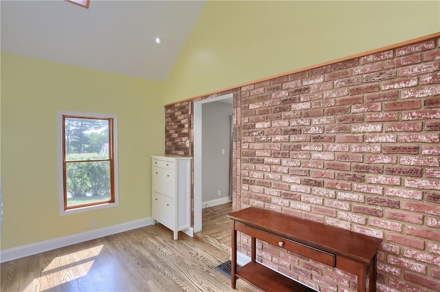 1060 Cherry Hill Rd, North Sewickley Twp, PA 16117 - interior space with baseboards, light wood-style flooring, and vaulted ceiling