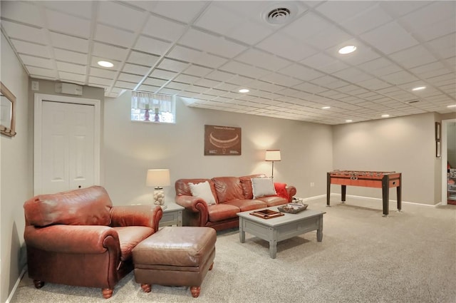 living area featuring baseboards, light colored carpet, recessed lighting, and visible vents