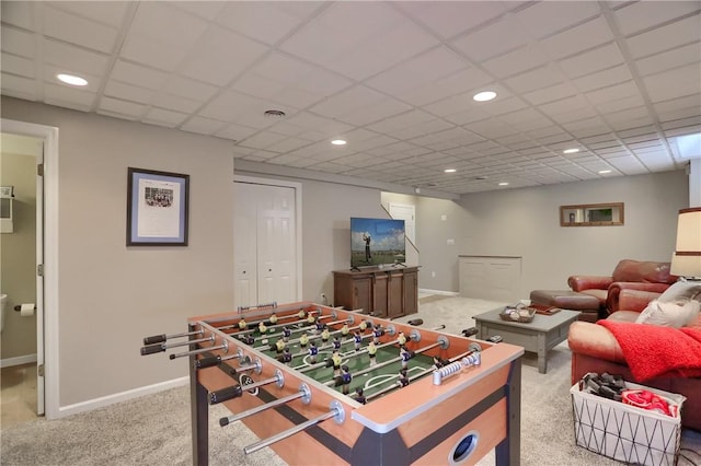 recreation room with baseboards, carpet flooring, and recessed lighting