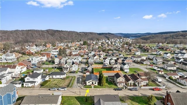 aerial view with a mountain view and a residential view