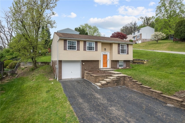 948 Broglie Dr, South Park, PA 15236 - split foyer home featuring brick siding, an attached garage, driveway, and a front yard