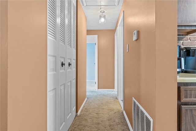 948 Broglie Dr, South Park, PA 15236 - hallway with baseboards, carpet, attic access, and visible vents