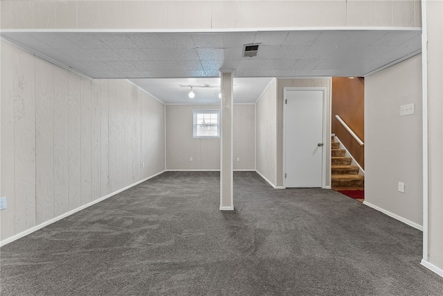 948 Broglie Dr, South Park, PA 15236 - basement featuring stairs, wooden walls, visible vents, and carpet