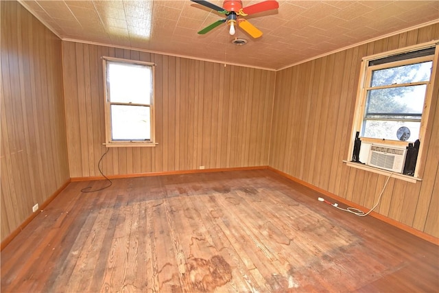 407-409 4th Ave, Ford City Boro, PA 16226 - empty room featuring wood-type flooring, a ceiling fan, cooling unit, and wooden walls