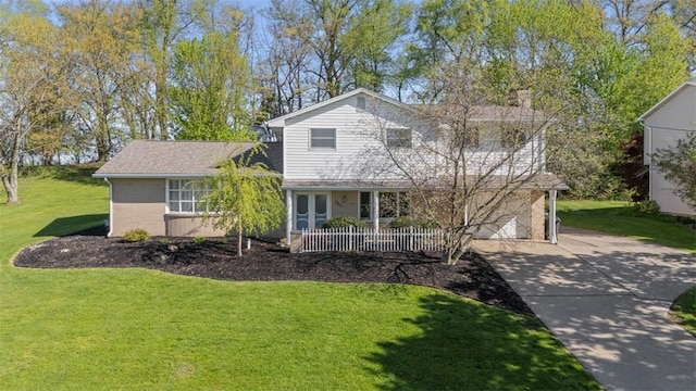 638 Morningstar Dr, Franklin Twp, PA 16117 - traditional-style home with a garage, a front lawn, driveway, and a chimney