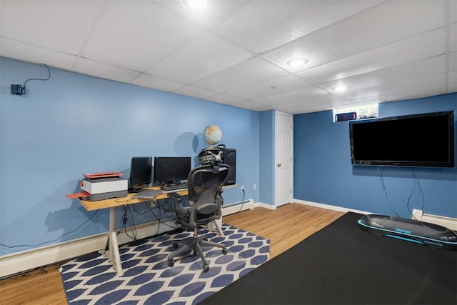638 Morningstar Dr, Franklin Twp, PA 16117 - office area featuring baseboards, a drop ceiling, wood finished floors, and baseboard heating