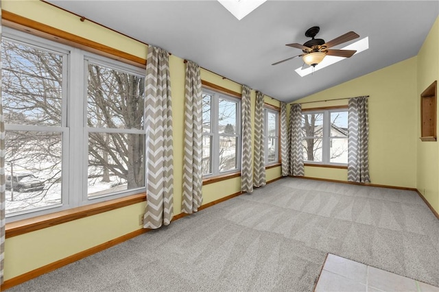 2425 Park Ave, South Franklin, PA 15301 - unfurnished sunroom featuring carpet, lofted ceiling with skylight, and a healthy amount of sunlight