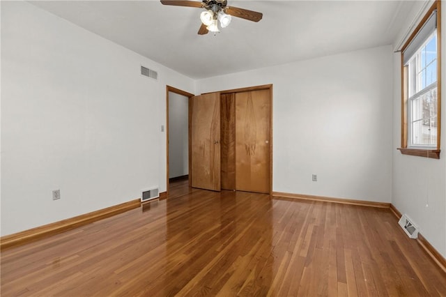 2425 Park Ave, South Franklin, PA 15301 - unfurnished bedroom with visible vents, baseboards, and hardwood / wood-style flooring