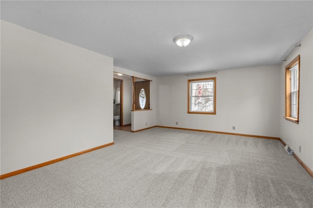 2425 Park Ave, South Franklin, PA 15301 - spare room with baseboards, visible vents, and light colored carpet