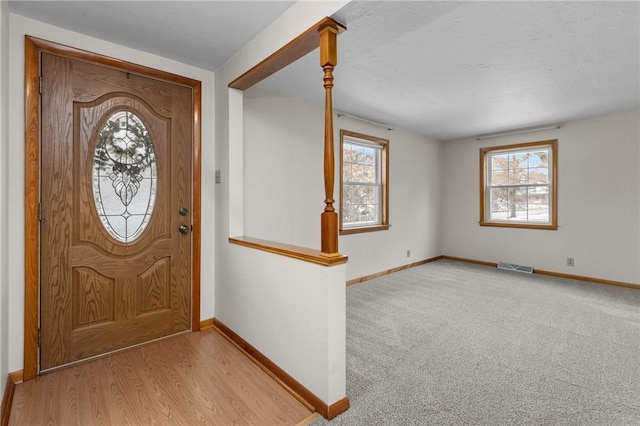 2425 Park Ave, South Franklin, PA 15301 - entrance foyer featuring visible vents, baseboards, and a healthy amount of sunlight