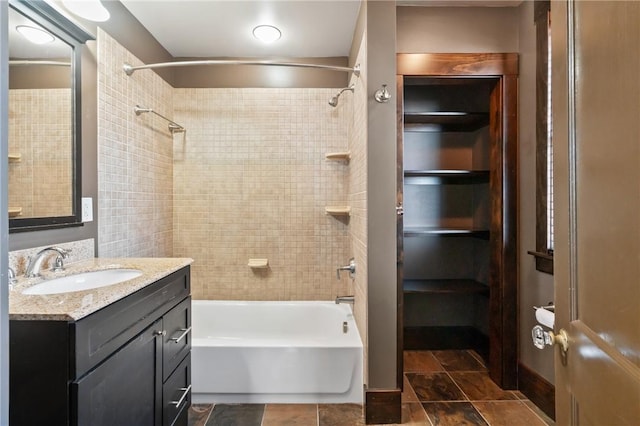 full bathroom featuring vanity and bathing tub / shower combination