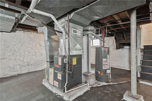 utilities with visible vents, heating unit, and water heater