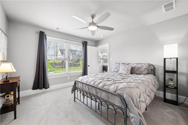 131 Woodford Dr, Adams Twp, PA 16033 - carpeted bedroom featuring baseboards, ceiling fan, and visible vents