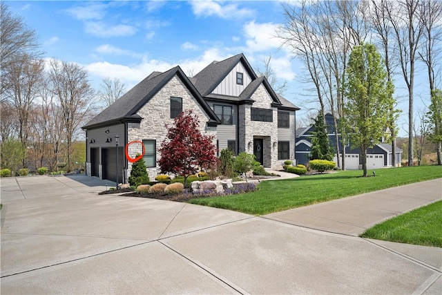 131 Woodford Dr, Adams Twp, PA 16033 - view of front of house with a garage, board and batten siding, driveway, and stone siding