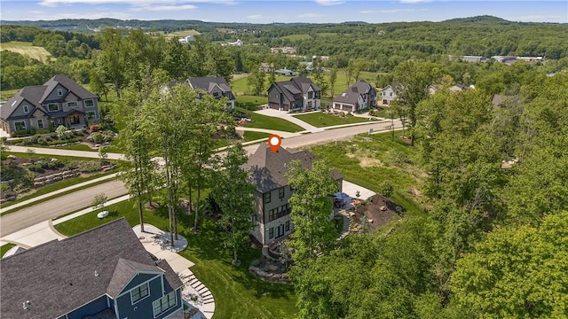 131 Woodford Dr, Adams Twp, PA 16033 - aerial perspective of suburban area featuring a forest