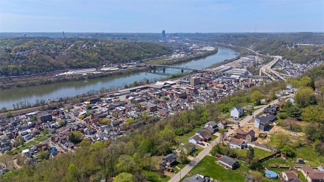 aerial view featuring a residential view and a water view